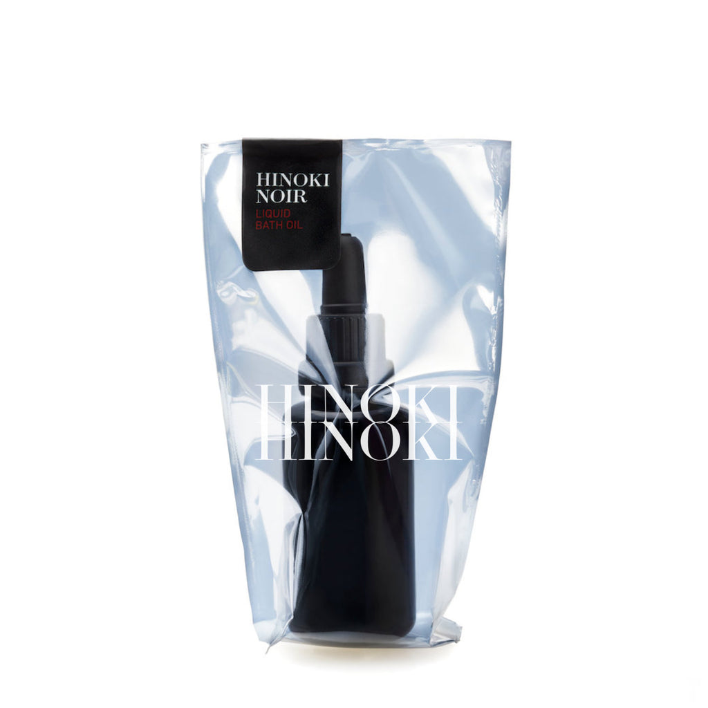 Black bottle with 'Hinoki Noir' packaging on a white background