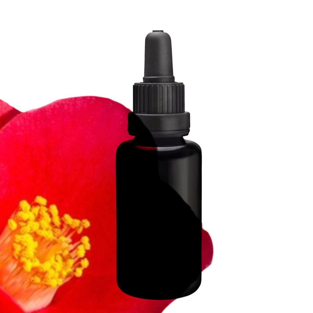 Black dropper bottle in front of a red flower with yellow center
