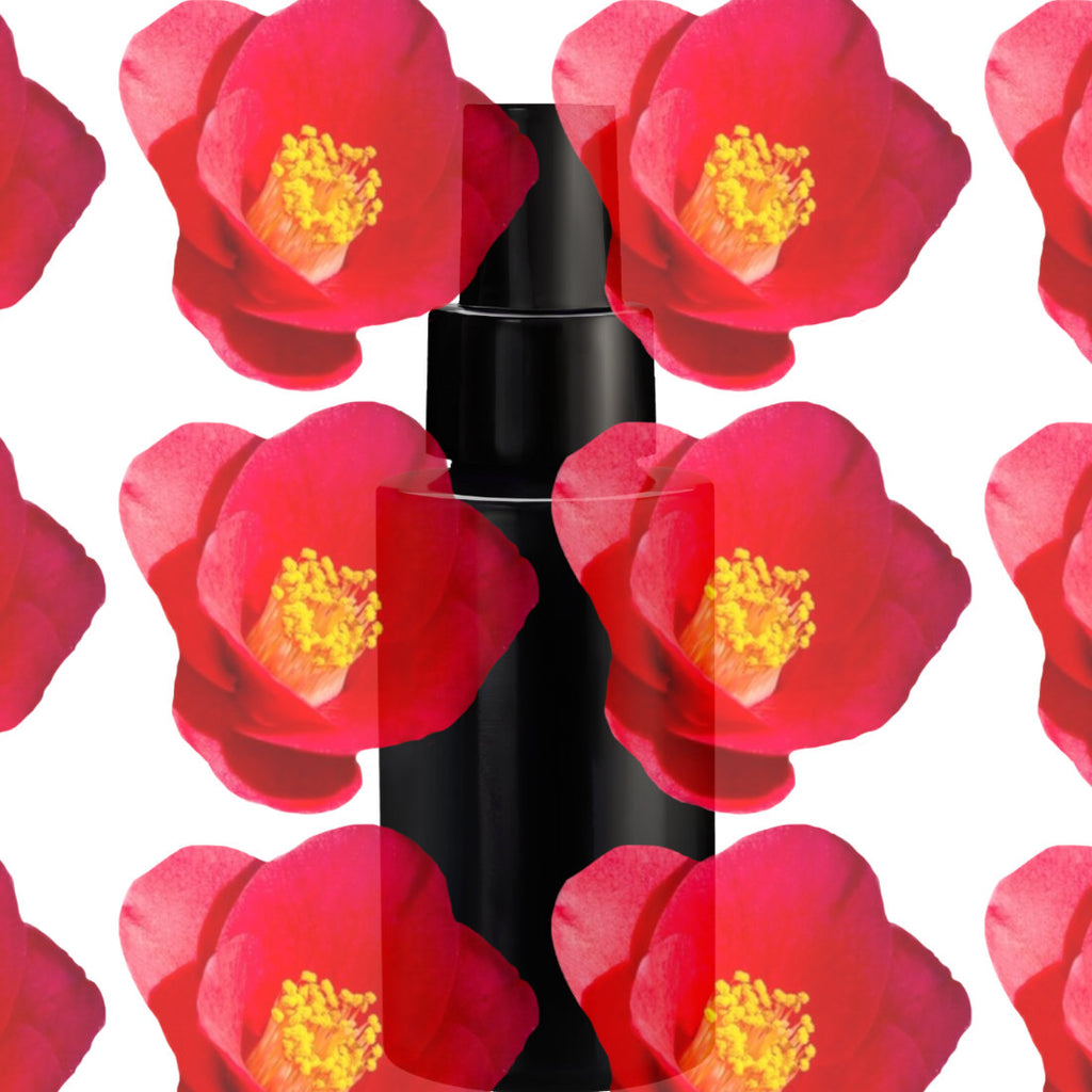 Black cylindrical container with red floral pattern