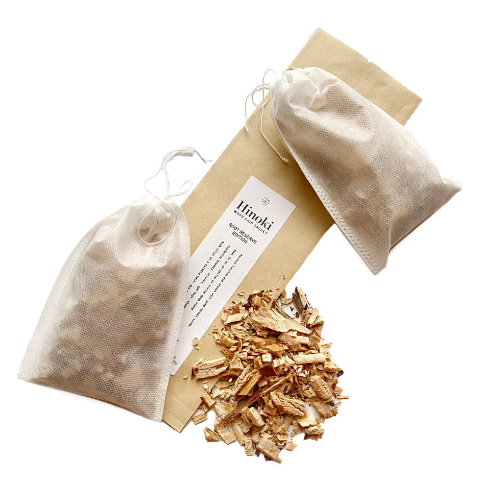 bags and loose wood chips leaves with a brand label on a white background